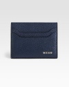 Pebbled Italian leather card case is fashioned with signature logo detail.Six card slots4 x 3Imported