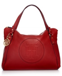 Preppy, posh and poised to meet your daily demands, this leather lovely from Tommy Hilfiger is the perfect piece. Logo-embossed with gleaming hardware, the spacious design stows everything from eReader to opera tickets. Preppy, posh and poised to meet your daily demands, this leather lovely from Tommy Hilfiger is the perfect piece. Logo-embossed with gleaming hardware, the spacious design stows everything from eReader to opera tickets.