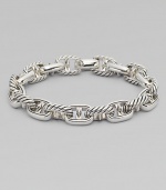 Defined anchor links handsomely crafted in fine sterling silver.Sterling SilverAbout 9Lobster claspImported
