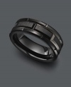 Let style say it all in Triton's stately ring. Men's ring is crafted in black tungsten carbide with a unique matrix design carved into the band (8 mm). Size 10.