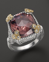 A gleaming raspberry crystal is framed in 18K yellow gold and white sapphires on this sterling silver Monaco ring from Judith Ripka. A gleaming raspberry crystal is framed in 18K yellow gold and white sapphires on this sterling silver Monaco ring from Judith Ripka.