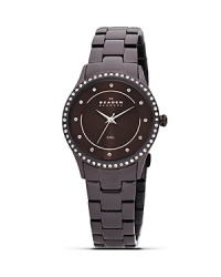 The elegant simplicity of Skagen's ceramic and Swarovski crystal watch ensures it's the perfect piece for round-the-clock style. The elegant simplicity of Skagen's ceramic and Swarovski crystal watch ensures it's the perfect piece for round-the-clock style.