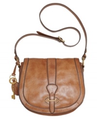 Grab hold of great style with this vintage-inspired flap bag from Fossil. A saddle silhouette, goldtone hardware and a signature key charm add the perfect finishing touches to this unique design. Grab hold of great style with this vintage-inspired flap bag from Fossil. A saddle silhouette, goldtone hardware and a signature key charm add the perfect finishing touches to this unique design.