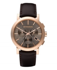 This Burberry watch features a brown leather strap and round rose gold ion-plated stainless steel case. Taupe chronograph dial with iconic Burberry check pattern features rose gold tone stick indices, date window at four o'clock, three subdials, three hands and logo. Swiss made. Quartz movement. Water resistant to 50 meters. Two-year limited warranty. This Burberry watch features a brown leather strap and round rose gold ion-plated stainless steel case. Taupe chronograph dial with iconic Burberry check pattern features rose gold tone stick indices, date window at four o'clock, three subdials, three hands and logo. Swiss made. Quartz movement. Water resistant to 50 meters. Two-year limited warranty.