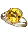 Add a punch-bright pop of color. Effy Collection's stunning swirl ring features a round-cut citrine (3-1/8 ct. t.w.) surrounded by round-cut diamonds (1/8 ct. t.w.). Crafted in 14k gold.