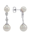 Shimmering organic pearls and sparkling cubic zirconia make a dramatic statement on these sterling silver drops.