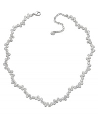 Swarovski's stunning rhodium-plated mixed metal necklace adds instant sophistication to any outfit, by day or night. Timeless, feminine, and graceful, the fluid silhouette sparkles in clear crystal pavé. Approximate length: 15 inches + 2-inch extender. Swarovski's stunning rhodium-plated mixed metal necklace adds instant sophistication to any outfit, by day or night. Timeless, feminine, and graceful, the fluid silhouette sparkles in clear crystal pavé. Approximate length: 15 inches + 2-inch extender.