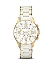 Do the white think with this gold and silicone watch from MARC BY MARC JACOBS. This sporty-chic piece boasts quartz movement for an uptick in practicality. Do the white think with this gold and silicone watch from MARC BY MARC JACOBS. This sporty-chic piece boasts quartz movement for an uptick in practicality.