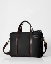 With its trim, modern lines and intuitive pocket organizers, this tote sharpens your on-the-go look. Plus, it's eco-friendly, made of extra-soft nylon recycled from discarded fishing nets, so you'll maintain a lower carbon footprint. With its trim, modern lines and intuitive pocket organizers, this tote sharpens your on-the-go look. Plus, it's eco-friendly, made of extra-soft nylon recycled from discarded fishing nets, so you'll maintain a lower carbon footprint.