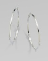 From the Thorn Collection. Slender, square-edged hoops, sprinkled with spiky thorns, too tiny to be truly menacing. Sterling silverDiameter, about 1¾PiercedImported