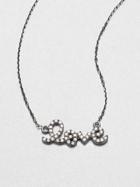 Dazzling diamonds set in dark, black rhodium-plated 14k gold on a link chain. Diamonds, .11 tcwBlack rhodium-plated 14k goldLength, about 16Pendant size, about .66Spring ring closureImported Dazzling diamonds set in dark, black rhodium-plated 14k gold on a link chain. Diamonds, .11 tcwBlack rhodium-plated 14k goldLength, about 16Pendant size, about .66Spring ring closureImported