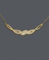 Adorn your neckline with a beautifully delicate piece. Wrapped in Love™ necklace features twists of 14k gold and round- and baguette-cut diamond (1/3 ct. t.w.). Approximate length: 16 inches. Approximate drop: 2 inches.