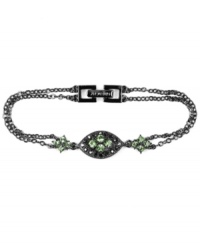 Glamour in green. Gorgeous green-hued glass accents add a glittering, glamorous touch to this Givenchy bracelet. Featuring a double-row chain link silhouette, it's crafted in hematite tone mixed metal. Approximate length: 7-1/4 inches.