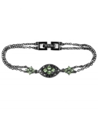 Glamour in green. Gorgeous green-hued glass accents add a glittering, glamorous touch to this Givenchy bracelet. Featuring a double-row chain link silhouette, it's crafted in hematite tone mixed metal. Approximate length: 7-1/4 inches. Glamour in green. Gorgeous green-hued glass accents add a glittering, glamorous touch to this Givenchy bracelet. Featuring a double-row chain link silhouette, it's crafted in hematite tone mixed metal. Approximate length: 7-1/4 inches.