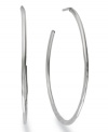 A trendy take on a traditional design. Studio Silver's open hammered hoop earrings are a must for every contemporary woman's collection. Crafted in sterling silver. Approximate diameter: 2 inches.