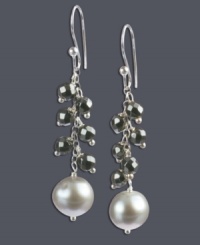 Add a little ambiance. Chic cluster earrings create an evening-ready look with sparkling hematite clusters (18 ct. t.w.) and a grey cultured freshwater pearl (8-8-1/5 mm). Set in sterling silver. Approximate drop: 2 inches. Add a little ambiance. Chic cluster earrings create an evening-ready look with sparkling hematite clusters (18 ct. t.w.) and a grey cultured freshwater pearl (8-8-1/5 mm). Set in sterling silver. Approximate drop: 2 inches.