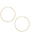 Forever stylish, forever chic. This pair of endless hoop earrings comes in 14k gold. Approximate diameter: 35 mm.