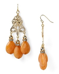 Gold medallions and faceted stones capture exotic casbah cool. Earrings by Lydell NYC. Gold medallions and faceted stones capture exotic casbah cool. Earrings by Lydell NYC.