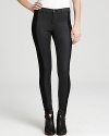 These stretch rag & bone/JEAN skinny jeans feature a sleek coating for shine, while a matte black stripe at the sides provides a standout contrast. Definitively edgy, rock the look with a tissue-thin tee and lace-up booties and head directly downtown.
