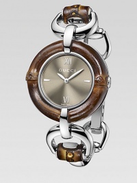 From the Bamboo Collection. This nature-inspired style features beautiful bamboo details mixed with sleek stainless steel. Swiss quartz movementWater resistant to 3 ATMRound stainless steel case, 35mm (1.4) Bamboo accented bezelBrown sun-brushed dialBar and Roman numeral hour markers at 3, 6, 9 and 12Bamboo accented stainless steel bangleMade in Switzerland Please note: Bamboo accents are not water resistant. From the Bamboo Collection. This nature-inspired style features beautiful bamboo details mixed with sleek stainless steel. Swiss quartz movementWater resistant to 3 ATMRound stainless steel case, 35mm (1.4) Bamboo accented bezelBrown sun-brushed dialBar and Roman numeral hour markers at 3, 6, 9 and 12Bamboo accented stainless steel bangleMade in Switzerland Please note: Bamboo accents are not water resistant.