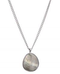 Whisk yourself away to the seashore at any time. Kenneth Cole New York's shimmery, summery style feature an oval-cut shell pendant set in silver tone mixed metal. Approximate length: 18 inches + 3-inch extender. Approximate drop: 1-3/4 inches. Whisk yourself away to the seashore at any time. Kenneth Cole New York's shimmery, summery style feature an oval-cut shell pendant set in silver tone mixed metal. Approximate length: 18 inches + 3-inch extender. Approximate drop: 1-3/4 inches.