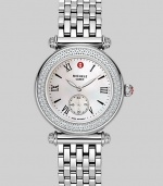 From the Caber Collection. A timepiece both graceful and sophisticated, in polished stainless steel with a diamond bezel and mother-of-pearl dial. Swiss quartz movement Water-resistant to 5 ATM Diamond bezel, 0.58 tcw Slightly oval case; 46mm X 37mm (1.81 X 1.46) Sapphire crystal Mother-of-pearl dial Roman numerals Second hand sub-dial at 6 o'clock Link bracelet; width 18mm (.71) Imported