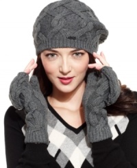 Ooh-la-la! This impossibly chic cable knit beret from Calvin Klein evokes the allure of Parisian charm. Cozy, comfortable and always in style. Ooh-la-la! This impossibly chic cable knit beret from Calvin Klein evokes the allure of Parisian charm. Cozy, comfortable and always in style.