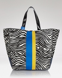Work a two tone vibe with this tote from Juicy Couture. An updated take of the brand's much loved day bag, this glam style flaunts bold black and white stripes and cool color blocked detailing. Work a two tone vibe with this tote from Juicy Couture. An updated take of the brand's much loved day bag, this glam style flaunts bold black and white stripes and cool color blocked detailing.