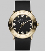 Streamlined timekeeping with a polished goldplated finish and fine leather strap.Quartz movement Water resistant to 3 ATM IP (ionic plated) gold bezel with engraved logo Stainless steel round case, 36mm, (1.42) Black dial IP gold numeral and hour markers Leather strap, 20mm, (.79) Imported 