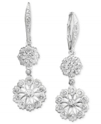 Glorious medallions highlighted by crystals delectably dangle from these gorgeous drop earrings set in silvertone mixed metal. Approximate drop: 1-1/2 inches. Glorious medallions highlighted by crystals delectably dangle from these gorgeous drop earrings set in silvertone mixed metal. Approximate drop: 1-1/2 inches.