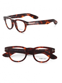 A sophisticated set of acetate frames with clear, easily replaced lenses. Wear the glasses as a simple accessory or replace the lenses with your own prescription. Replaceable optical lenses include permanent logo accent Metal T temple detail Made in Italy A sophisticated set of acetate frames with clear, easily replaced lenses. Wear the glasses as a simple accessory or replace the lenses with your own prescription. Replaceable optical lenses include permanent logo accent Metal T temple detail Made in Italy