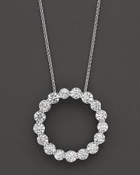 A gorgeous round diamond pendant set in white gold, crafted from a series of brilliant round stones. A gorgeous round diamond pendant set in white gold, crafted from a series of brilliant round stones.