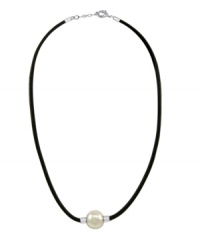 A modern spin on the traditional pearl pendant. Majorica necklace features a white, organic, man-made pearl (14 mm) strung on a trendy black leather cord. Setting and clasp crafted in sterling silver. Approximate length: 18 inches + 2-inch extender. Approximate drop: 1/2 inch. A modern spin on the traditional pearl pendant. Majorica necklace features a white, organic, man-made pearl (14 mm) strung on a trendy black leather cord. Setting and clasp crafted in sterling silver. Approximate length: 18 inches + 2-inch extender. Approximate drop: 1/2 inch.