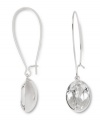 Sophisticated and stunning. The simple silhouette of Swarovski's Puzzle earrings is enhanced by a beautiful bezel-set clear crystal. Set in silver tone mixed metal. Approximate diameter: 1 inch. Approximate drop: 1-1/2 inches.