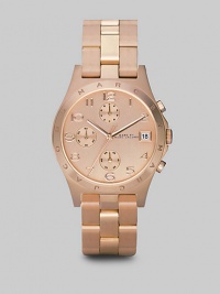 Elegant and understated, with a brushed IP (ionic plated) rose gold finish and chronograph functions.Quartz movement Water-resistant to 3ATM Rose gold finished bezel with logo Round stainless steel case with rose goldplating; 36.5 mm diameter (1.44) Rose gold finished dial with three chronograph sub dials Arabic numerals Date display at 3:00 Second hand Rose goldplated link bracelet; 18mm wide (.71) Imported Elegant and understated, with a brushed IP (ionic plated) rose gold finish and chronograph functions.Quartz movement Water-resistant to 3ATM Rose gold finished bezel with logo Round stainless steel case with rose goldplating; 36.5 mm diameter (1.44) Rose gold finished dial with three chronograph sub dials Arabic numerals Date display at 3:00 Second hand Rose goldplated link bracelet; 18mm wide (.71) Imported