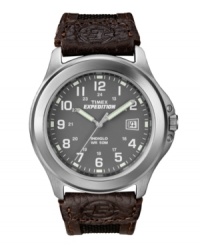 Hit the great outdoors with a watch that knows no boundaries: the Timex Expedition. Black nylon and brown leather strap and round brushed silver tone mixed metal case. Charcoal dial features white numerals, printed minute track, date window at three o'clock, luminous hour and minute hands, and logo. Quartz movement. Water resistant to 50 meters. One-year limited warranty. Hit the great outdoors with a watch that knows no boundaries: the Timex Expedition. Black nylon and brown leather strap and round brushed silver tone mixed metal case. Charcoal dial features white numerals, printed minute track, date window at three o'clock, luminous hour and minute hands, and logo. Quartz movement. Water resistant to 50 meters. One-year limited warranty.