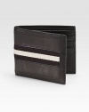 Iconic trainspotting web detail trims this smooth calfskin leather design.One billfold compartmentSix card slots4¼ x 3½Made in Switzerland