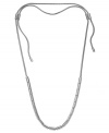 Just the right size. You choose which length best suits your style with Michael Kors adjustable necklace. Wear it long for a trendy look, or short and sassy with a lower-cut shirt. Any way you wear it, this necklace adds a just the right amount of shine with polished slide beads in silver tone mixed metal. Approximate length: up to 37 inches.