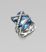 From the Cable Wrap Collection. A stunning London blue topaz is wrapped in cables and diamonds in sterling silver. London blue topazDiamonds, 0.42 tcwSterling silver Width, about ½Imported 