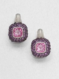 A cushion-cut pink corundum stone surrounded by pavé amethyst stones set in textured sterling silver. Pink corundum and amethystSterling silverLength, about .75Lever backImported A cushion-cut pink corundum stone surrounded by pavé amethyst stones set in textured sterling silver. Pink corundum and amethystSterling silverLength, about .75Lever backImported