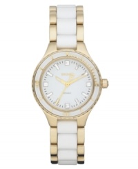 Graceful gold tone trim and sleek white ceramic define new style on this DKNY watch. Graceful gold tone trim and sleek white ceramic define new style on this DKNY watch.