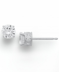 Diamond stud earrings have never sparkled so bright. This unique style features a round-cut diamond at center with a row of round-cut diamonds in the post (1/2 ct. t.w.). Four-prong setting crafted in 14k white gold. Approximate diameter: 3-4/5 mm. Diamond stud earrings have never sparkled so bright. This unique style features a round-cut diamond at center with a row of round-cut diamonds in the post (1/2 ct. t.w.). Four-prong setting crafted in 14k white gold. Approximate diameter: 3-4/5 mm.