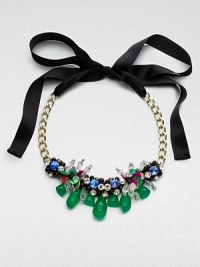 A statement piece with a bold kaleidoscope of colorful stones, beads and trim on a link chain with a ribbon closure. Resin and glass stones, beads and trimGoldtoneLength, about 16 to 31 adjustableRibbon tie closureMade in Italy A statement piece with a bold kaleidoscope of colorful stones, beads and trim on a link chain with a ribbon closure. Resin and glass stones, beads and trimGoldtoneLength, about 16 to 31 adjustableRibbon tie closureMade in Italy