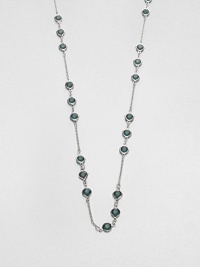 From the Black Tie Optional Collection. A long-enough-to-double chain is dotted with trios of faceted green stones in this graceful variation on a classic design.Glass and plasticSilvertoneLength, about 48Lobster claspImported From the Black Tie Optional Collection. A long-enough-to-double chain is dotted with trios of faceted green stones in this graceful variation on a classic design.Glass and plasticSilvertoneLength, about 48Lobster claspImported