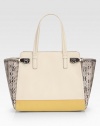 A fascinating combination of smooth leather and textured python gives this signature Salvatore Ferragamo design instant appeal.Double top handle, 8 dropZipper closureTwo outside zipper pocketsOne inside zipper pocketTwo inside open pocketsLeather lining13¼W X 7H X 2½DImported
