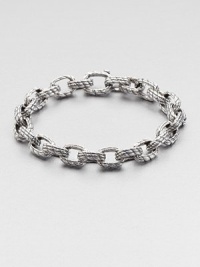 Sail away into a high-style with this medium oval-link bracelet finely crafted in superior sterling silver.Sterling silverAbout 9 diam.Imported Sail away into a high-style with this medium oval-link bracelet finely crafted in superior sterling silver.Sterling silverAbout 9 diam.Imported