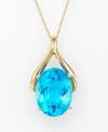 An oval-shaped blue topaz (12 ct. t.w.) set within 14k gold wishbone design radiates colorful elegance. Chain measures 18 inches.