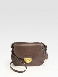 Polished leather in a simply chic flap design.Adjustable shoulder strap, 17-21½ dropPush-lock flap closureOne outside open pocketOne inside zip pocketTwo inside open pocketsSignature jacquard lining10¾W X 8H X 3¼DMade in Italy Polished leather in a simply chic flap design.Adjustable shoulder strap, 17-21½ dropPush-lock flap closureOne outside open pocketOne inside zip pocketTwo inside open pocketsSignature jacquard lining10¾W X 8H X 3¼DMade in Italy