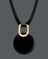Avant-garde design lends modern flair to every day. Round onyx disc pendant (22 mm) hangs from a simple black silk cord. Clasp and setting crafted in 14k gold. Approximate length: 18 inches. Approximate drop: 1-1/4 inches.