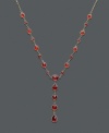 Ignite a flame with bold color along your neckline. This dramatic v-shaped necklace features brilliant oval-cut, round-cut, and pear-cut garnet (8-5/8 ct. t.w.) in a 14k gold setting. Approximate length: 17 inches. Approximate drop: 1-1/2 inches.